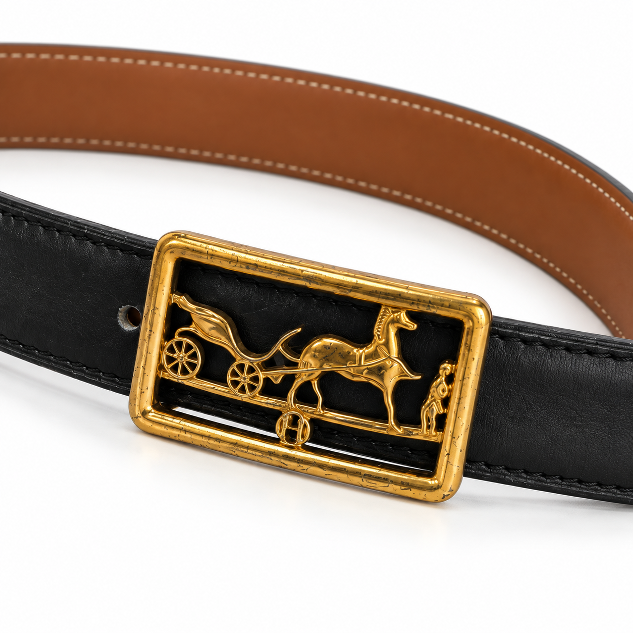 Hermès belt buckle detail on white background — AI-assisted studio image based on the actual item