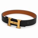 Hermès belt three-quarter view on white background — AI-assisted studio image based on the actual item